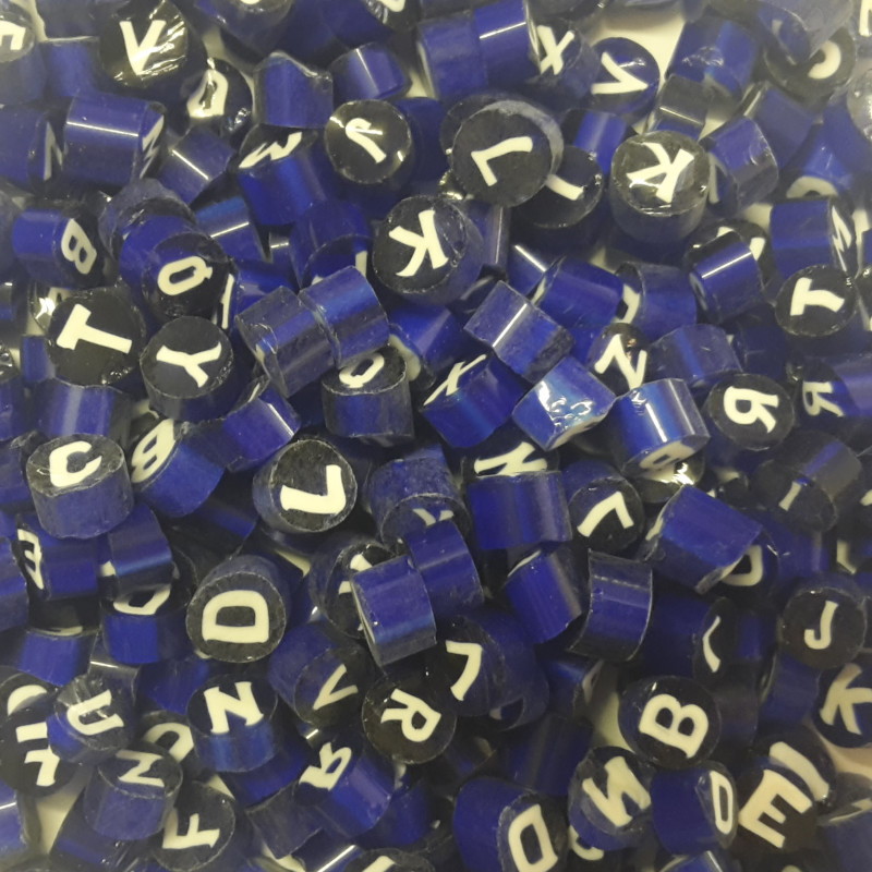 Opaque mixed letters millefiori